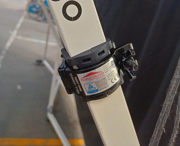 Close-up of Konligo event structure connection featuring a Truss Connection Adaptor securing aluminum truss sections, now available on MTN SHOP US.