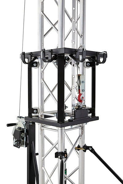 Detailed look at the automatic trigger brake safety system, pulley wheels, and moving steel carriage profile on the Kuzar K-10 tower lifting. - imagen 3